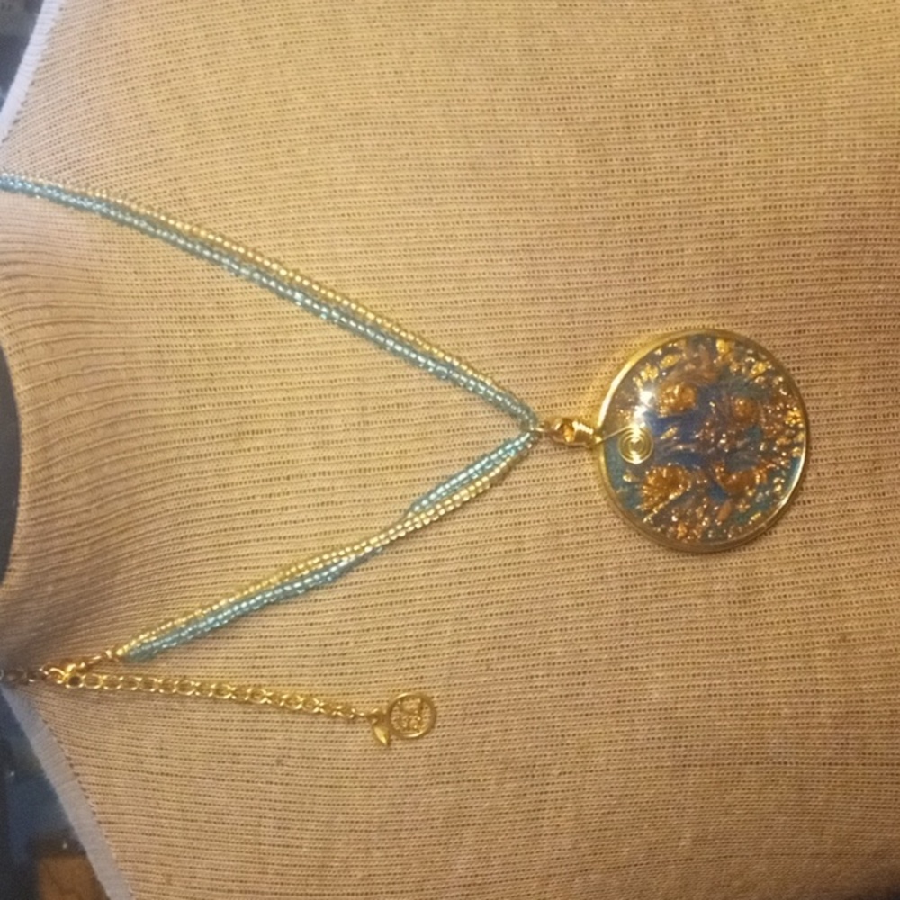 Erica lions glass necklace